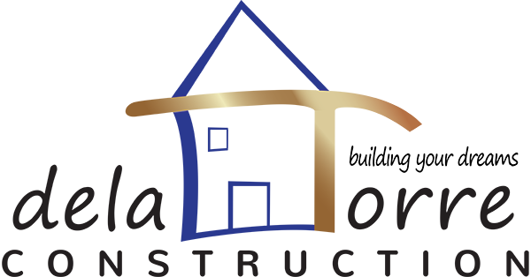 Logo of a construction company with a stylized house and gold roof.
